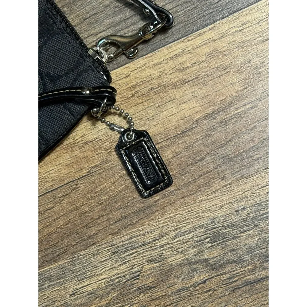 Coach Black Signature Zip Wristlet – Monogram Canvas – Silver Hardware